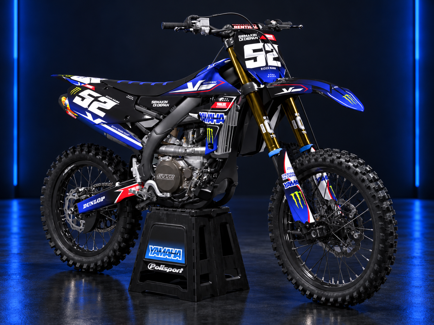Yamaha 52 motocross graphics in a blue-lit studio