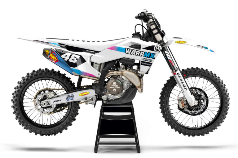 Club Warp semi-custom graphics kit on a Husqvarna motocross bike