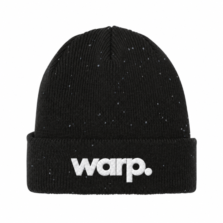 Black and graphite New Era speckled beanie with white warp. embroidery